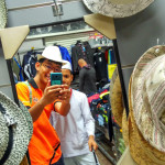 Lim Kah Meng shopping with young boy